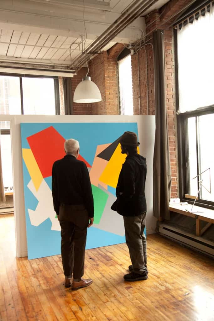 Marcel Barbeau and his grand-son, Manuel Barbeau-Lavalette, in the studio of the St-Ambroise Street.